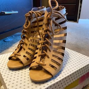 Brown strap up heels